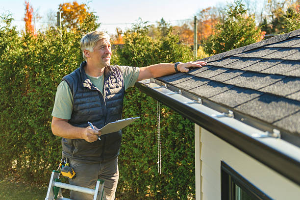 Professional Roofing technician working in Concord, NH